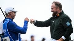 Inspired Lowry takes four-shot lead into final day